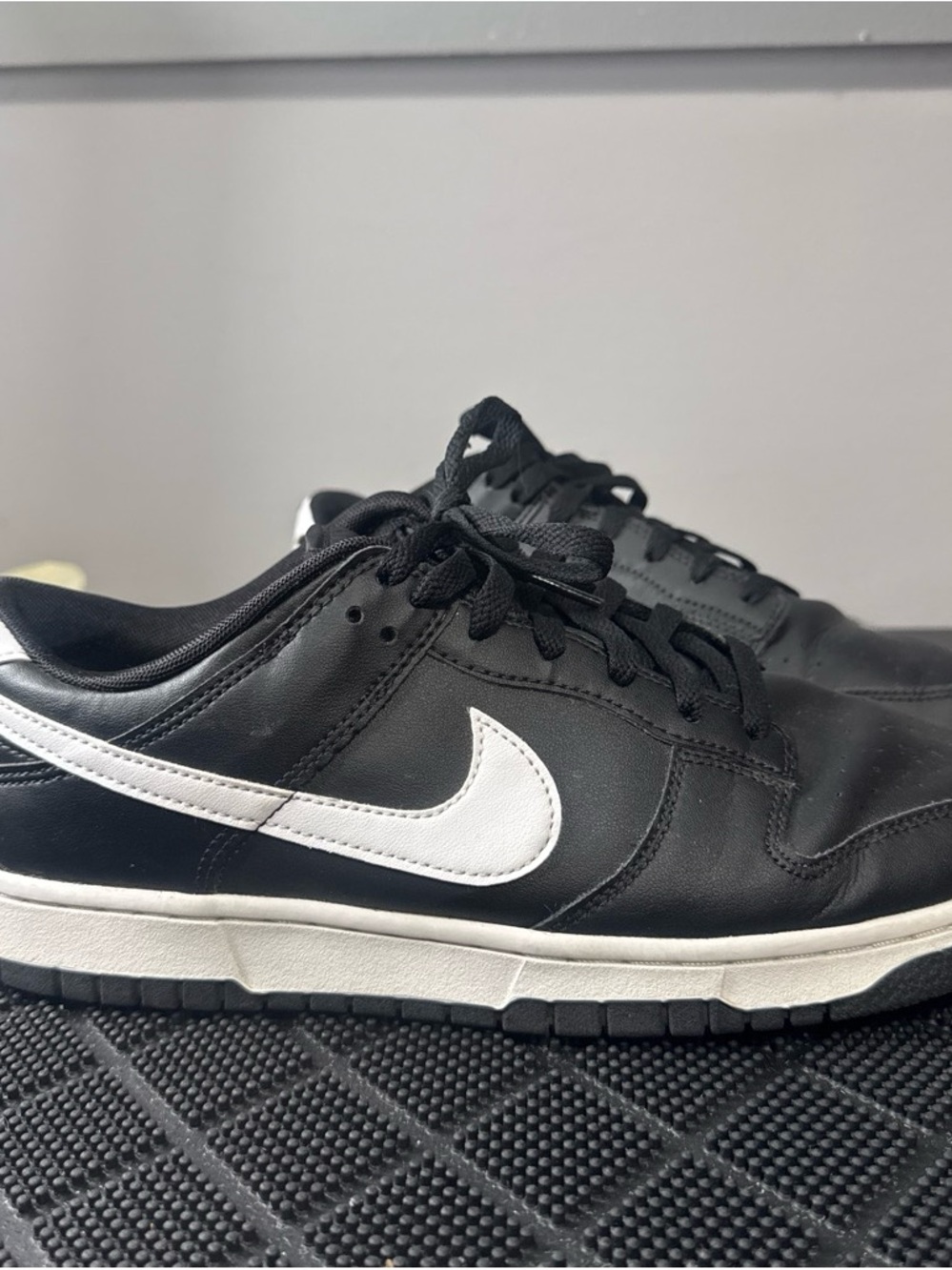 Nike Men’s Black Sneakers with White Swoosh